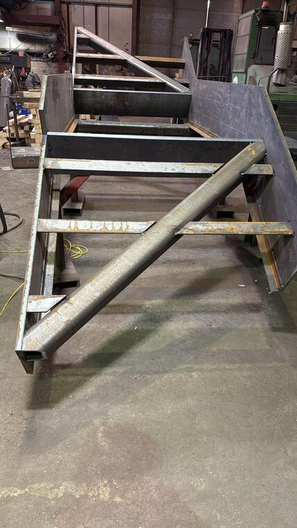 Close detail of welded box-section post base plate