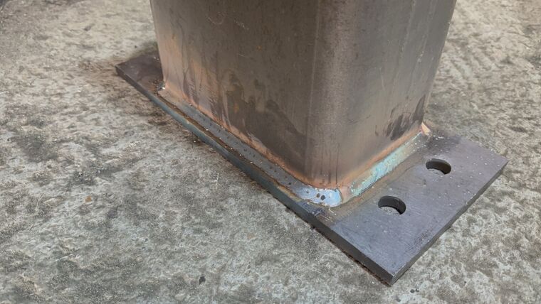 Box-section steel chassis frame with diagonal bracing
