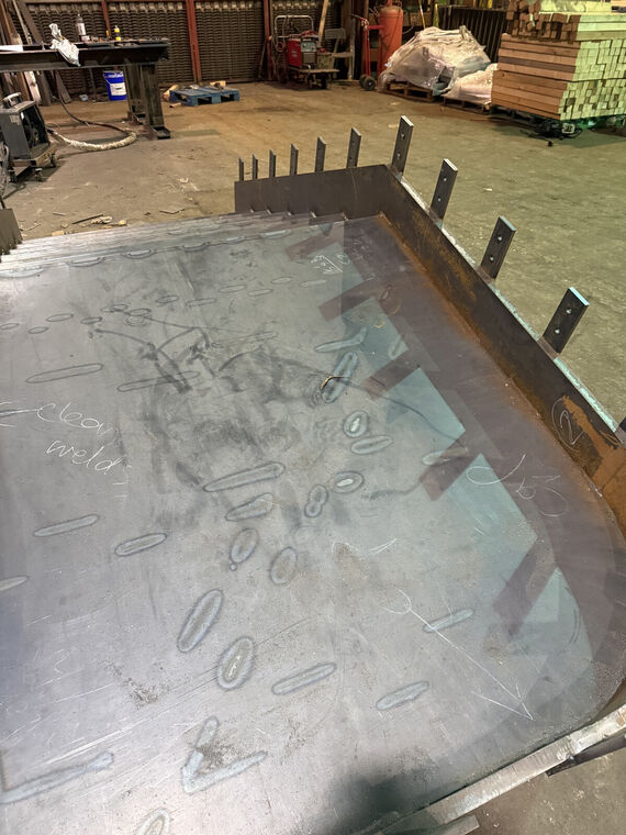 Fabricated steel platform with curved edge, close detail