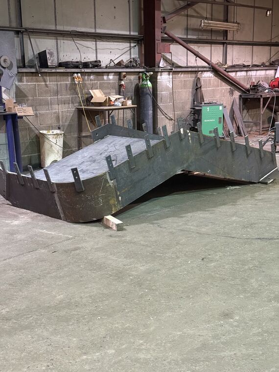 Fabricated steel staircase with landing platform